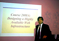Photo of Norm Hebert introducing the course 'Designing a Highly Available Web Infrastructure'