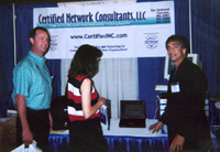 Photo of Norm Hebert displaying Cluster services to employees of NH-Denver